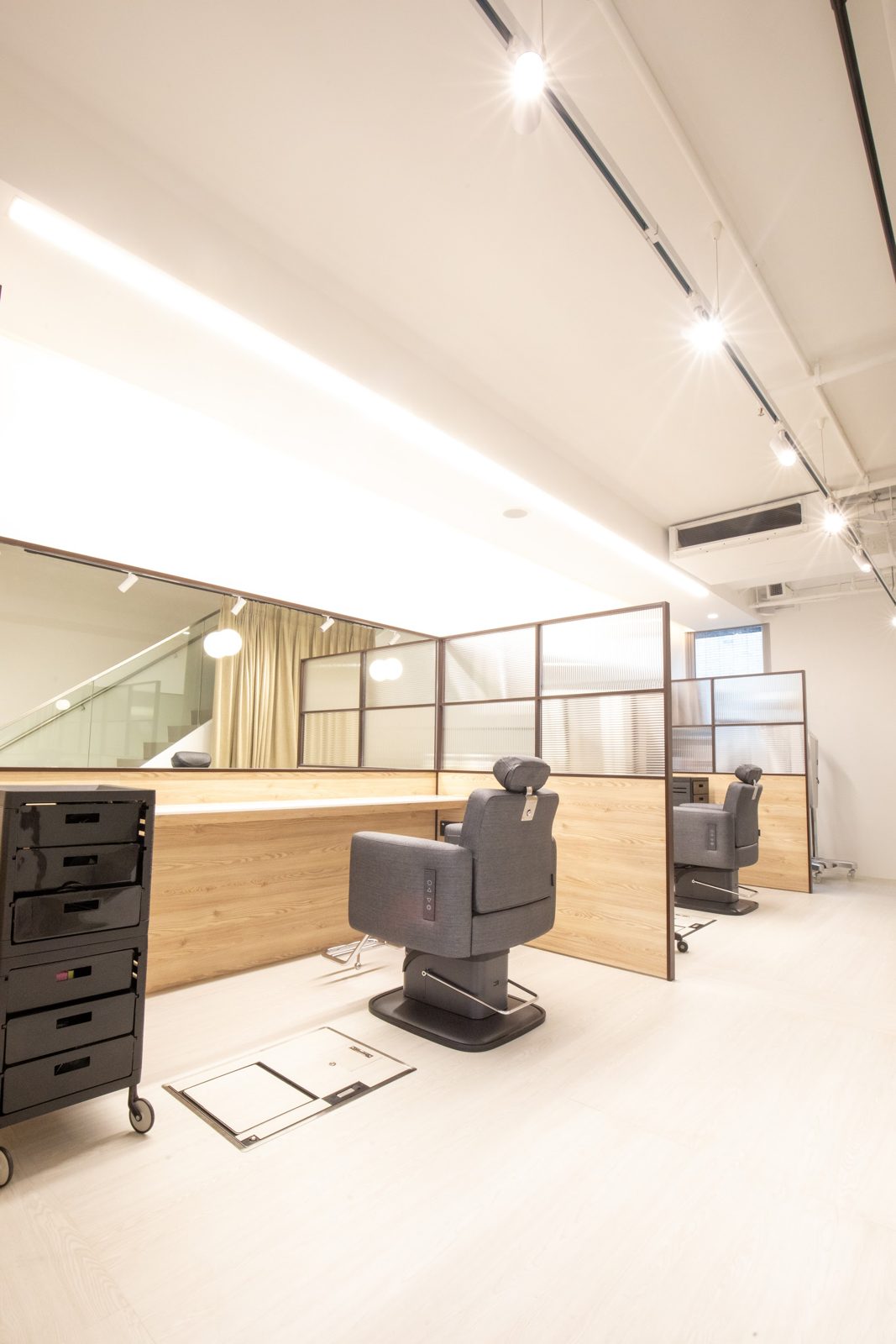 The styling floor with semi-private booths